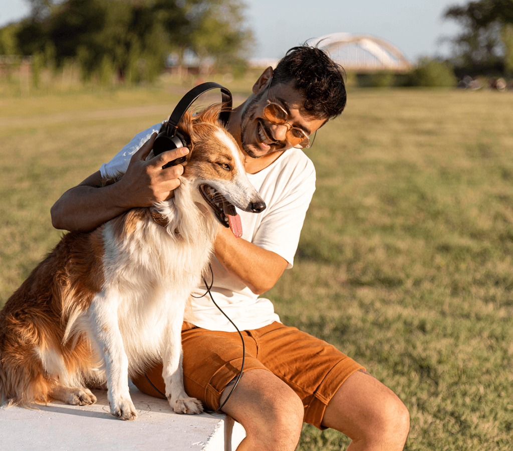 Image of a happy man and happy dog